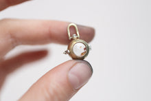 Load image into Gallery viewer, Petroleum Included Quartz Orb Locket
