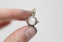 Load image into Gallery viewer, Petroleum Included Quartz Orb Locket
